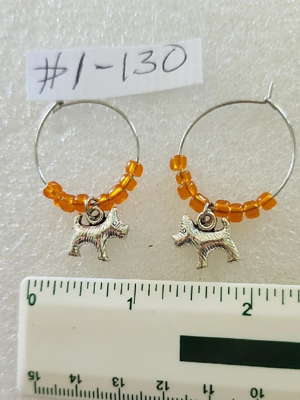 Hand Crafted Silver Dog Charm Hoop Earrings with Orange Beads